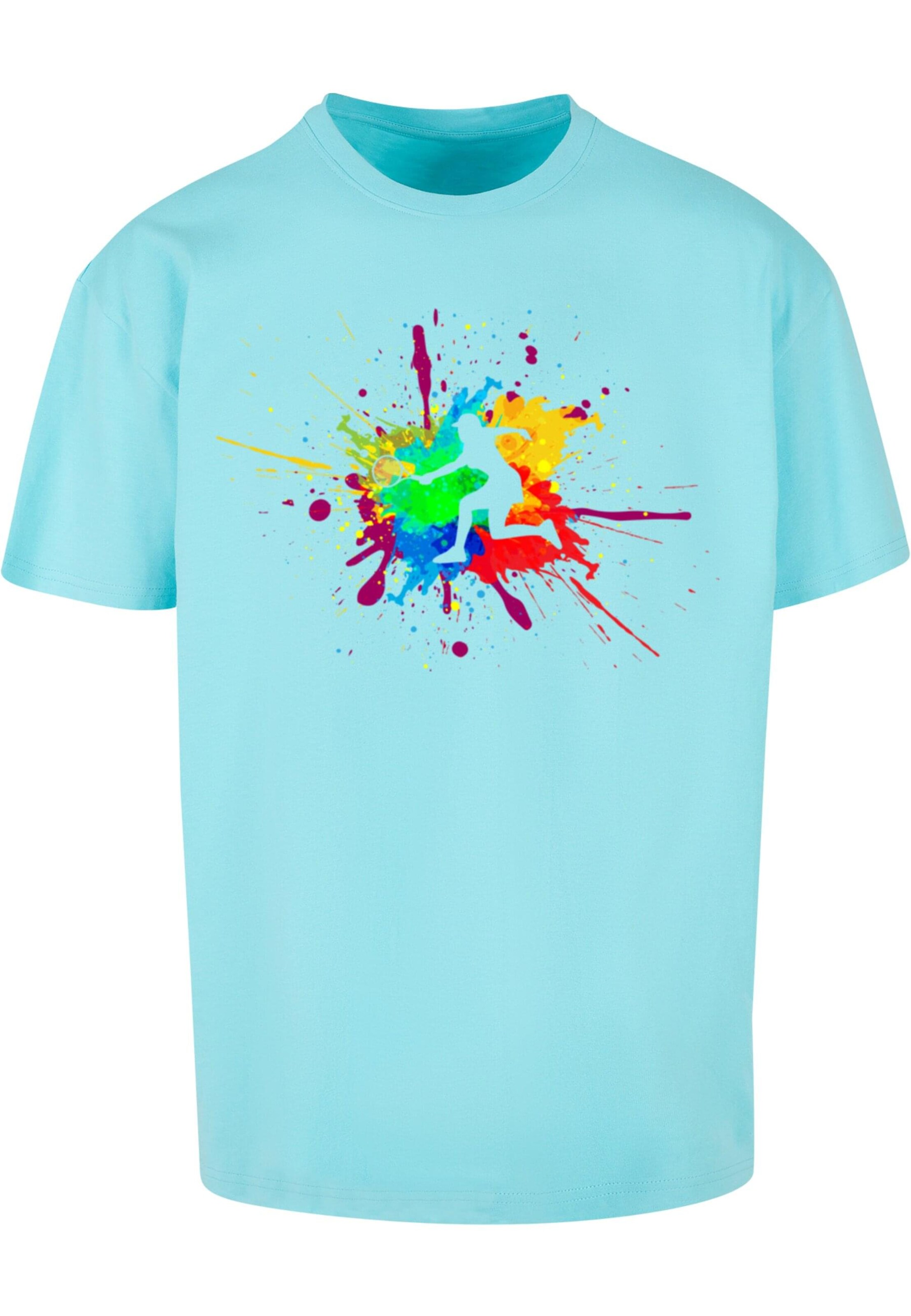 Merchcode T-Shirt 'Color Splash Player' in Blau: Vorderseite