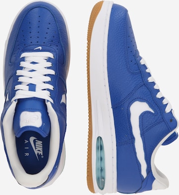 Royal blue nike trainers shop
