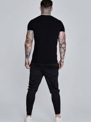 Tapered Pantaloni cargo 'Essentials Poly' di SikSilk in nero