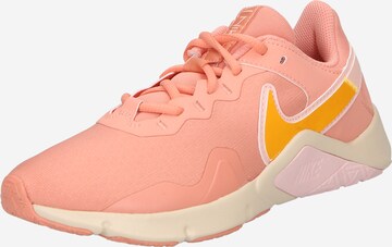 NIKE - Calzado deportivo en naranja: frente