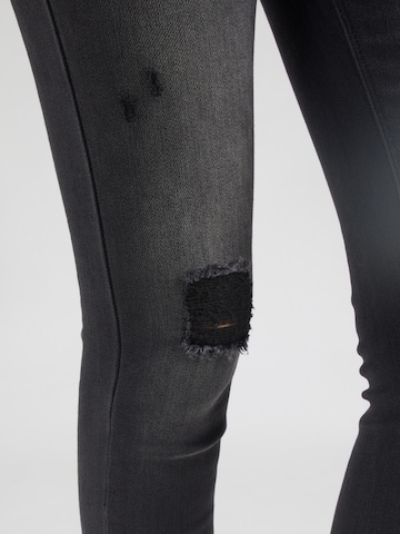 Skinny Jeans 'ONLMILA' di ONLY in nero