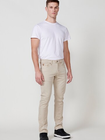Coupe slim Jean KOROSHI en beige
