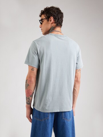 T-Shirt Calvin Klein Jeans en bleu : derrière