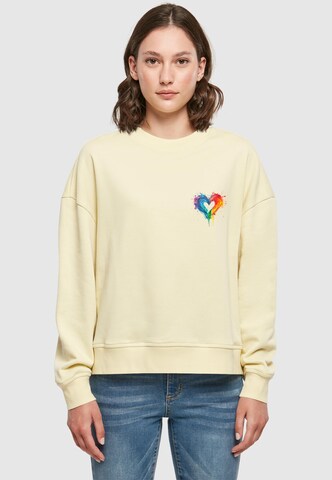 Sweat-shirt 'Pride Splash' Merchcode en jaune : devant