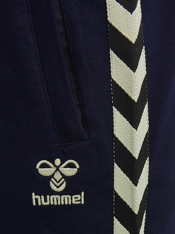 Effilé Pantalon de sport 'Move' Hummel en bleu