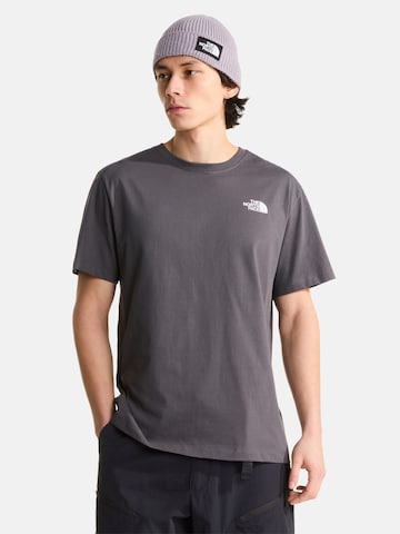 Maglietta 'M MOUNTAIN SKETCH SS TEE RELAXED' di THE NORTH FACE in nero: frontale