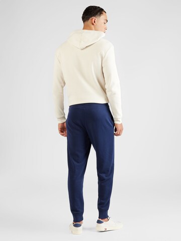 GAP Дънки Tapered Leg Панталон в синьо