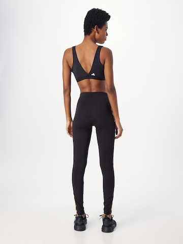 Skinny Pantalon de sport 'Essentials 3-Stripes Animal Print' ADIDAS SPORTSWEAR en noir