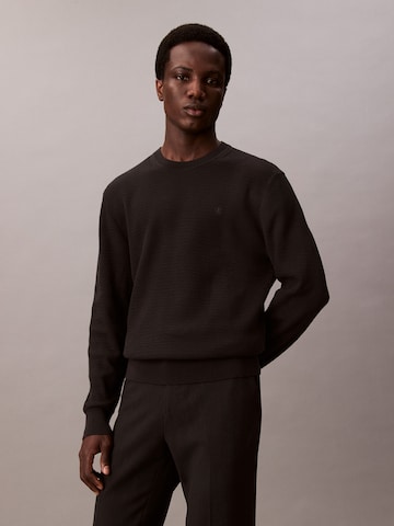 Pull-over Calvin Klein en noir : devant