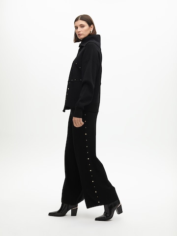 Wide leg Pantaloni di Lola Casademunt in nero