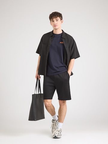NAPAPIJRI Bluser & t-shirts 'SUMI' i blå