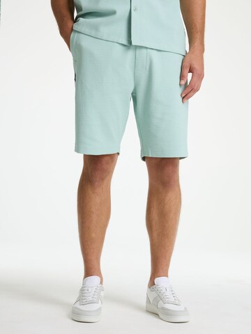 CHASIN' Regular Pants 'StoneS Structure' in Blue: front