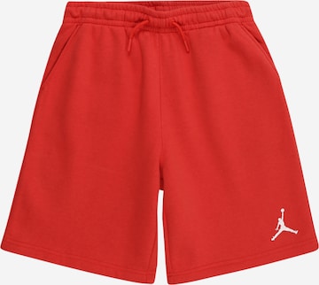 Pantaloni de la Jordan pe portocaliu: față