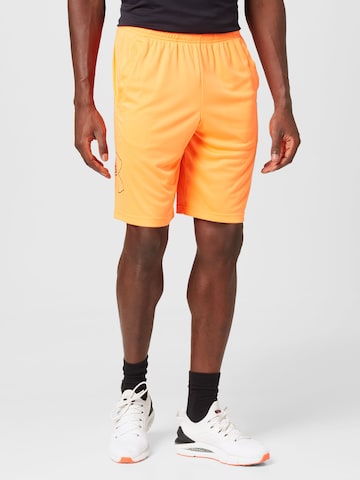 UNDER ARMOUR Свободный крой Спортивные штаны в Оранжевый: спереди