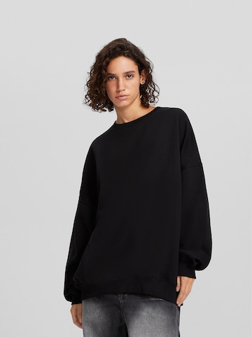 Sweat-shirt Bershka en noir : devant