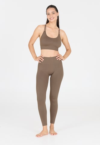 Athlecia Skinny Sportbroek 'Missori' in Bruin