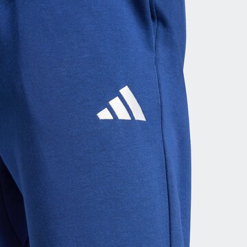 Effilé Pantalon de sport 'FEELCOZY' ADIDAS SPORTSWEAR en bleu