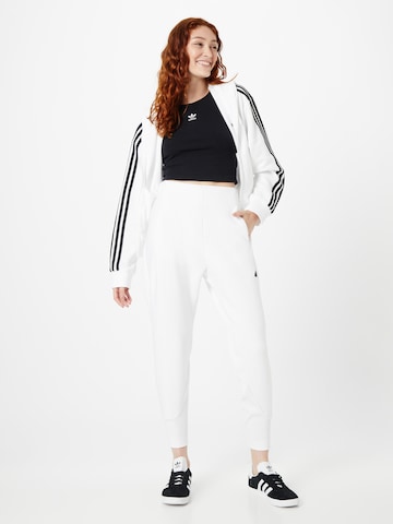 ADIDAS SPORTSWEAR Tapered Sports trousers 'Z.N.E.' in White