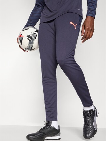 PUMA Regular Sports trousers 'Individual CUP' in Blue