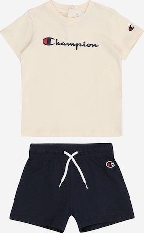 Set de la Champion Authentic Athletic Apparel pe bej: față