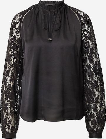 GUESS - Blusa en negro: frente