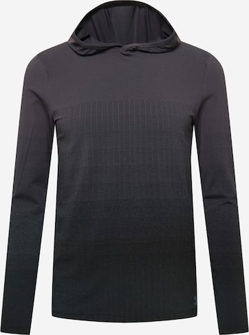 UNDER ARMOUR Funktionsshirt 'Seamless Lux' in Schwarz: predná strana