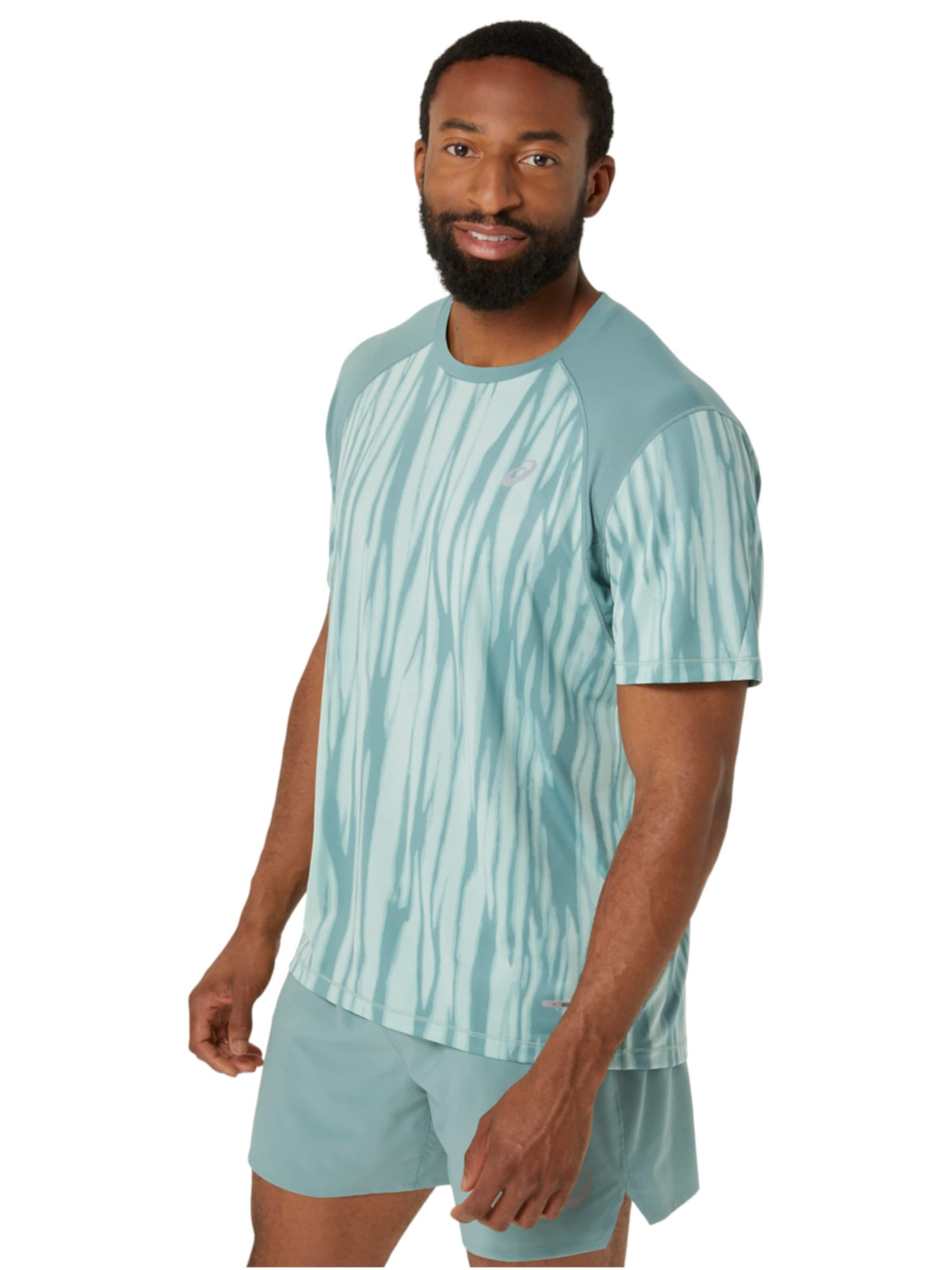 ASICS Shirt‌‌‌‌‌‌‌‌‌‌ in Grün