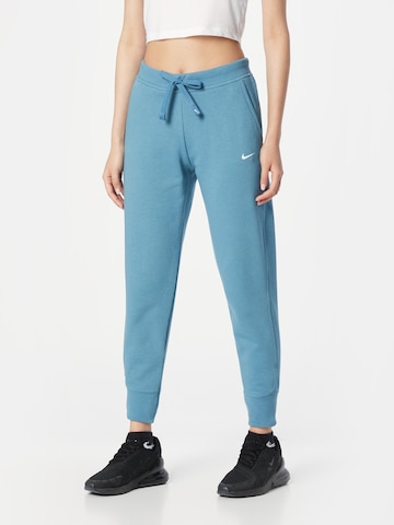 Effilé Pantalon de sport NIKE en bleu : devant