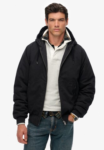 Superdry Tussenjas 'Surplus' in Zwart