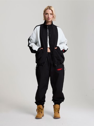 Effilé Pantalon AND1 en noir