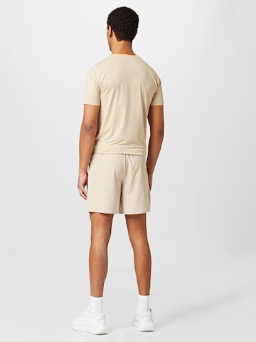 EA7 Emporio Armani Regular Sports trousers in Beige