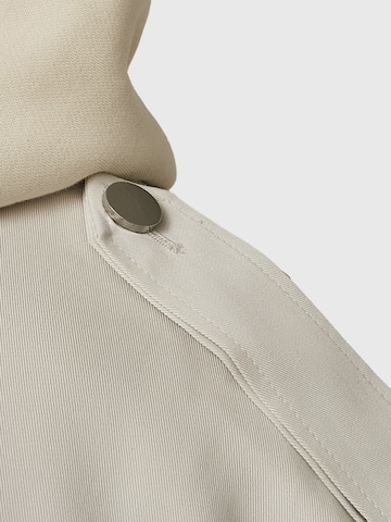 THE ODDS Tussenjas 'Trench Coat / LMTD Edition' in Beige