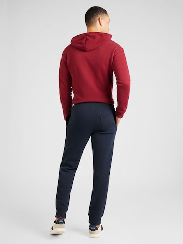 Superdry Tapered Broek 'Essential' in Blauw