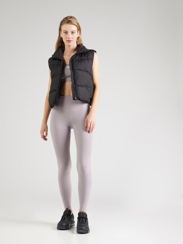 Skinny Pantaloni sportivi 'ZENVY' di NIKE in lilla