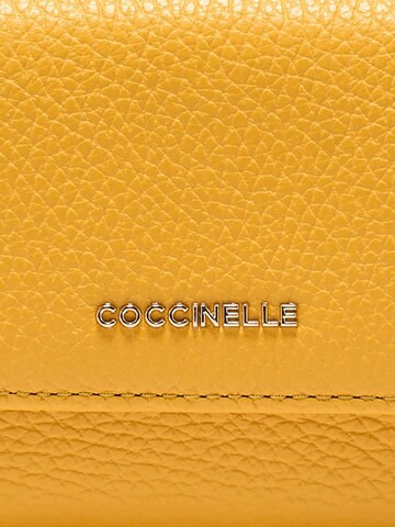 Portamonete 'COCCINELLE' di Coccinelle in giallo