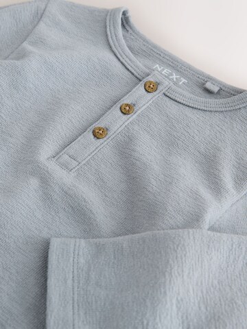 Next - Camiseta en azul