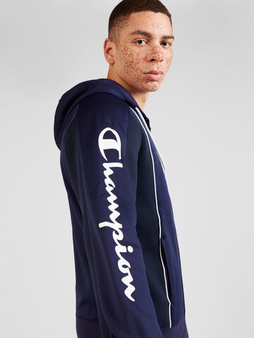 Champion Authentic Athletic Apparel Tracksuit in Blue