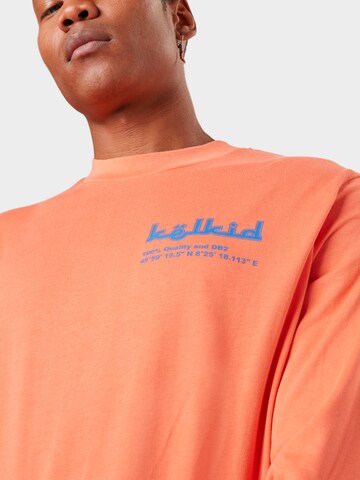 ABOUT YOU x Mero T-shirt 'Kelkid' i orange