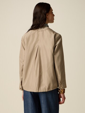 Cappotto invernale di oltre in beige