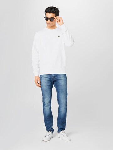 Sweat-shirt LACOSTE en blanc