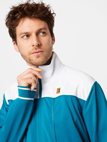 NIKE Athletic Jacket in Blue