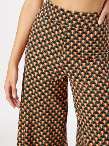 King Louie Szeroka nogawka Spodnie w kolorze pomarańczowy