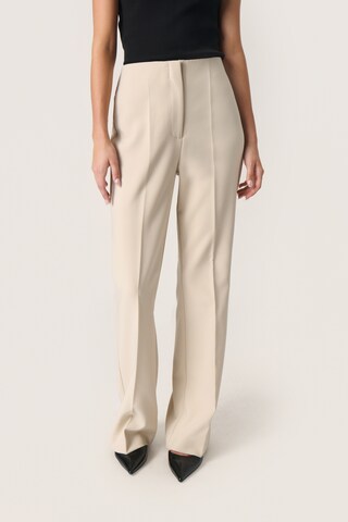SOAKED IN LUXURY Flared Bukser med fals 'Corinne' i beige: forside