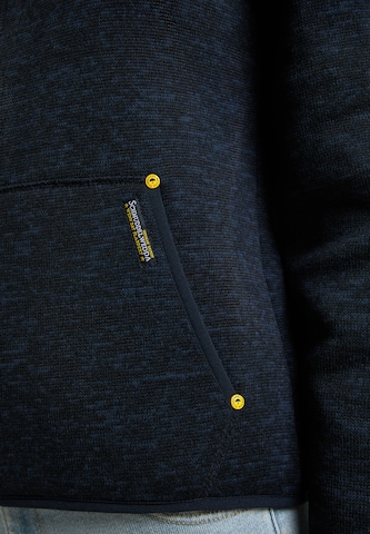 Schmuddelwedda Between-Season Jacket in Blue