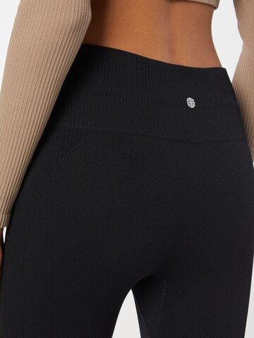 Athlecia Skinny Sportbroek in Zwart