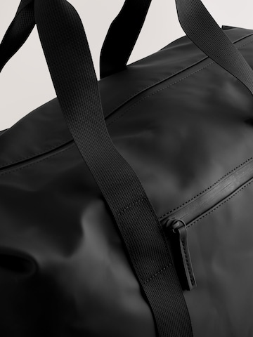 Next - Bolsa de viaje en negro