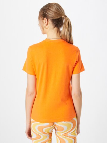 oranžinė WEEKDAY Marškinėliai 'Lean'