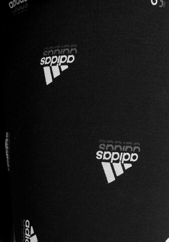 Slimfit Pantaloni sport 'Brand Love Print ' de la ADIDAS SPORTSWEAR pe negru