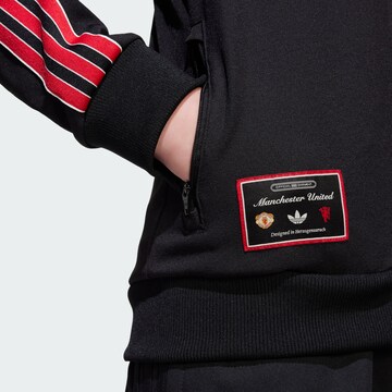 Veste outdoor 'Manchester United' ADIDAS ORIGINALS en noir