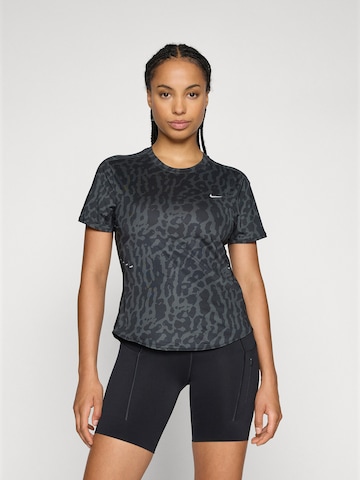 T-shirt fonctionnel 'SWIFT' NIKE en noir : devant